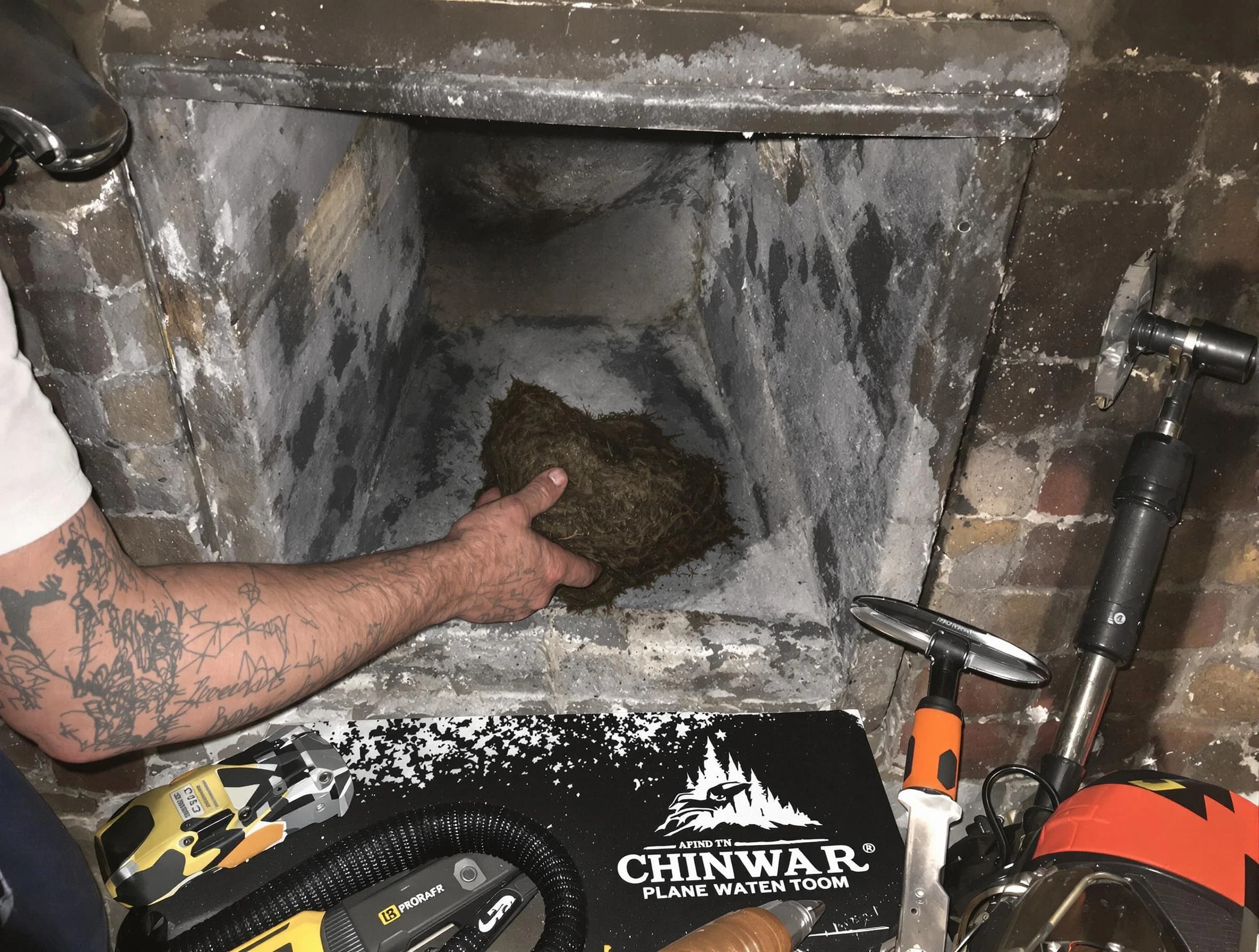 Odenville Chimney Sweep safely removing debris and screening chimney in Odenville, AL